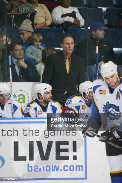 Head coach Dave Baseggio of the Bridgeport Sound Tigers looks on against the Hartford Wolf Pack at the Arena at Harbor Yard on December 4, 2005 in...