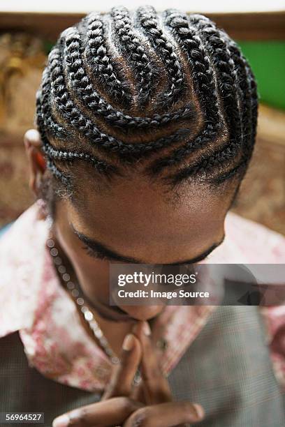 young man with braided hair - african cornrow braids stock pictures, royalty-free photos & images