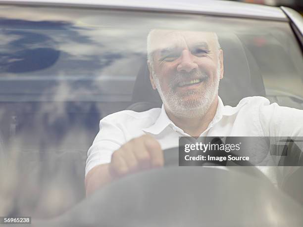 man driving a convertible - midlife crisis stock pictures, royalty-free photos & images