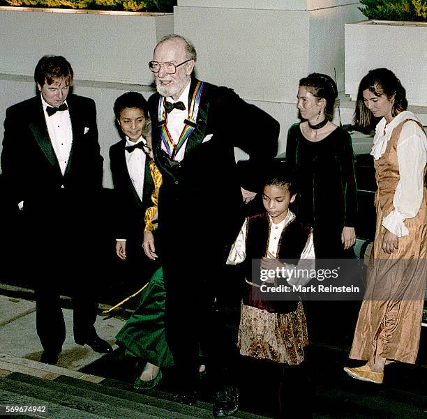 American musician and Kennedy Center Honors Awards recipient Pete Seeger , along with his wife, film director Toshi Seeger , arrives at the North...