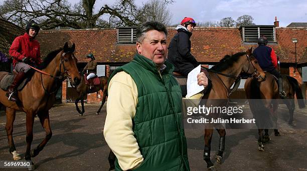 Trainer Paul Nicholls overs sees the departure of horses at his stables on March 1 in Ditcheat, England.