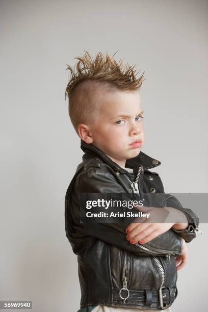 portrait of boy with mohawk in leather jacket - mohawk stock pictures, royalty-free photos & images