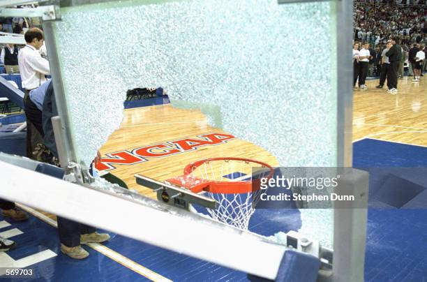 View of a broken backboard with the NCAA logo seen through it taken during a practice session before the 1995 Final Four Series on March 31, 1995.