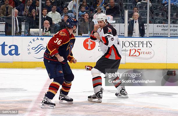 Andrew Peters of the Buffalo Sabres fights Eric Boulton of the Atlanta Thrashers at Philips Arena on January 31, 2006 in Atlanta, Georgia. The Sabres...