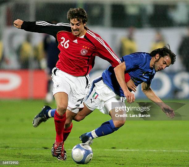 Sebastian Deisler of Germany challenges Alessandro Del Piero of Italy for the ball during the international friendly match between Italy and Germany...