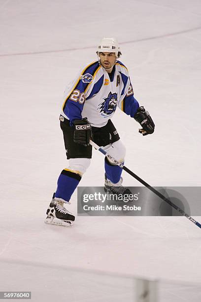 Allan Rourke of the Bridgeport Sound Tigers skates against the Hershey Bears at the Arena at Harbor Yard on December 7, 2005 in Bridgeport,...