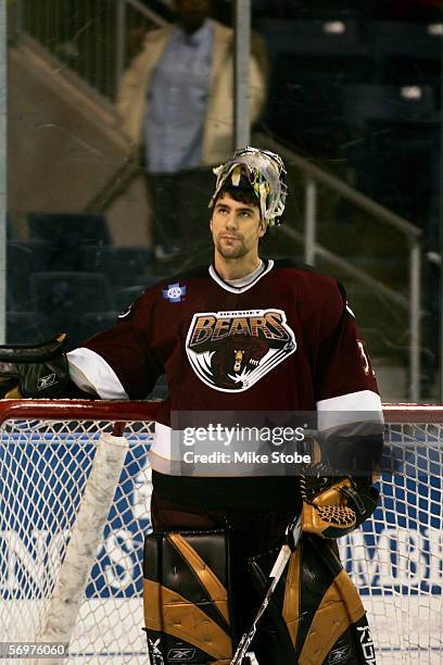 Frederic Cassivi of the Hershey Bears looks on against the Bridgeport Sound Tigers at the Arena at Harbor Yard on December 7, 2005 in Bridgeport,...