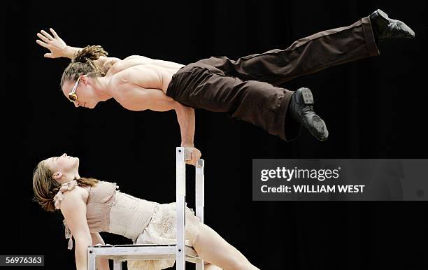 Christian Schooneveldt-Reid and Annabel Carberry , graduates from Australia's National Institute of Circus Arts , rehearse for their show 'Love...