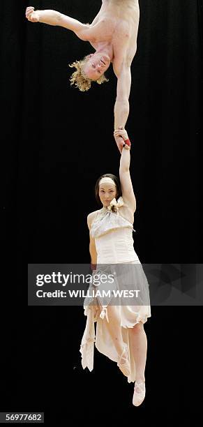 Derek Llewellin and Amelia Wood , graduates from Australia's National Institute of Circus Arts , rehearse for their show 'Love Happens', a...