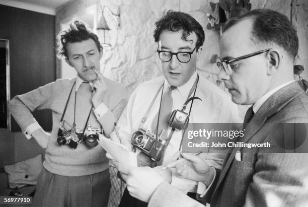 Peter Sellers at his home in Muswell Hill, London, with Picture Post journalist Bob Muller and photographer Thurston Hopkins, 17th April 1956....