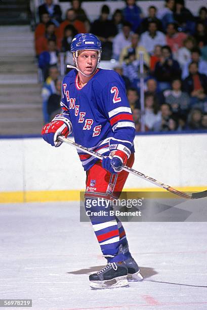 American hockey player Brian Leetch of the New York Rangers skates on the ice during a road game, November 1988.