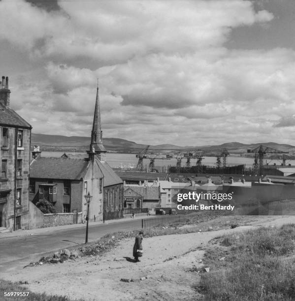 Street in the shipbuilding town of Greenock on the river Clyde in Scotland, 17th July 1954. Original publication: Picture Post - 7210 - Glasgow Sets...