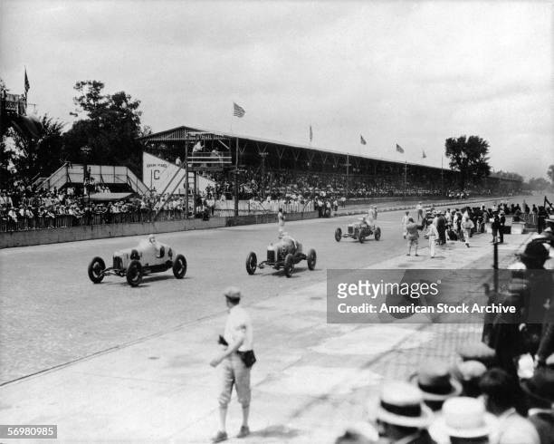 View of cars on the brick-surfaced track for a trial run before the for the Indianapolis 500 motor race, Speedway, Indiana, May 31, 1926.