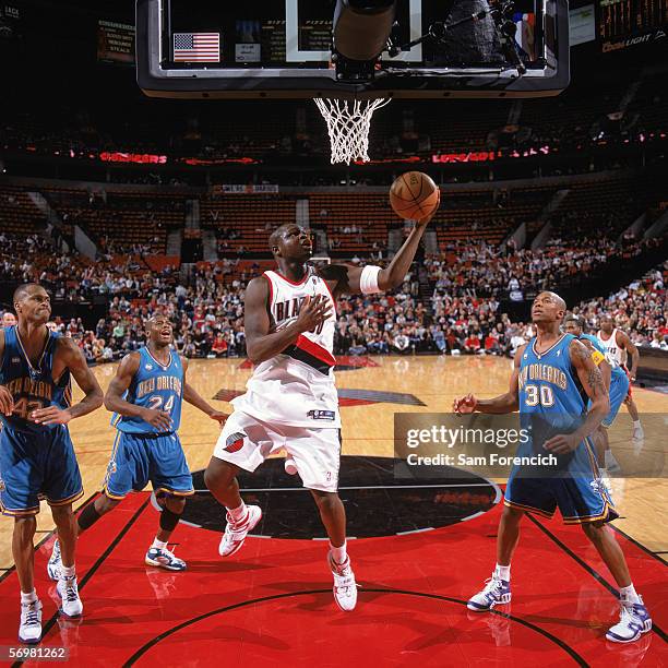 Zach Randolph of the Portland Trail Blazers takes the ball to the basket during a game against the New Orleans/Oklahoma City Hornets at The Rose...