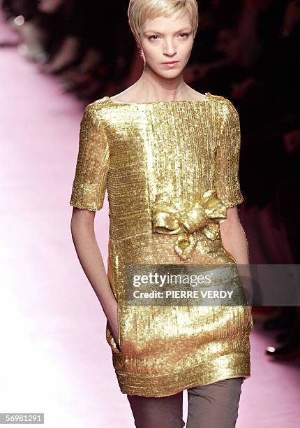 Model presents a creation by Italian designer Stefano Pilati for Yves Saint Laurent during the Autumn/Winter 2006-07 ready-to-wear collections in...