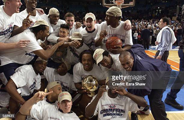 The University of Connecticut Huskies celebrate after the Big East tournament finals against the University of Pittsburgh Panthers at Madison Square...
