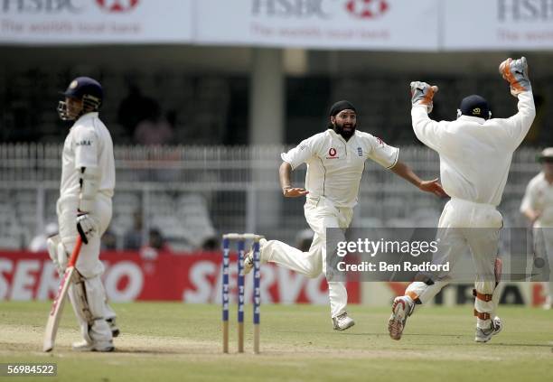 Monty Panesar of England celebrates taking the wicket of Sachin Tendulkar of India during day three of the First Test between India and England at...