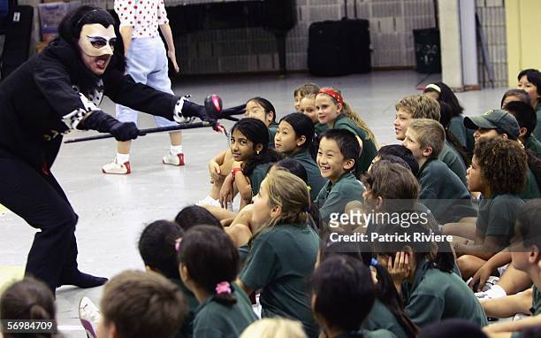 Singer Jane Parkin playing the role of a Witch performs in front of the Crown Street Primary school children during the OzOpera tour launch for...