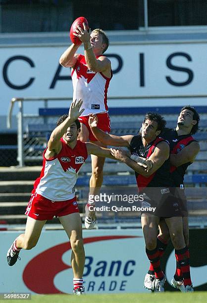 Ryan O'Keefe for the Swans takes a mark during the NAB Challenge match between the Essendon Bombers and Sydney Swans at Optus Oval March 03, 2006 in...