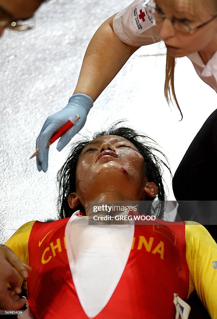 Li Yan Case Chinese champion Li Yan is unconscious as medics try to stabilize her ...