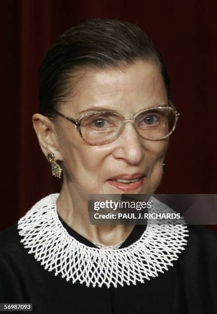 Washington, UNITED STATES: US Supreme Court Justice Ruth Bader Ginsburg looks at the camera as the justices pose for their class photo 03 March 2006...