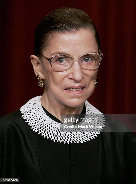 Supreme Court Justice Ruth Bader Ginsburg smiles during a photo session with photographers at the U.S. Supreme Court March 3, 2006 in Washington DC.