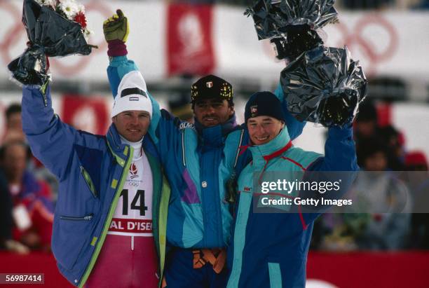 Gold medalist Alberto Tomba of Italy, silver medalist Marc Girardelli of Luxembourg and bronze medalist Kjetil Andre Aamodt of Norway after the mens...