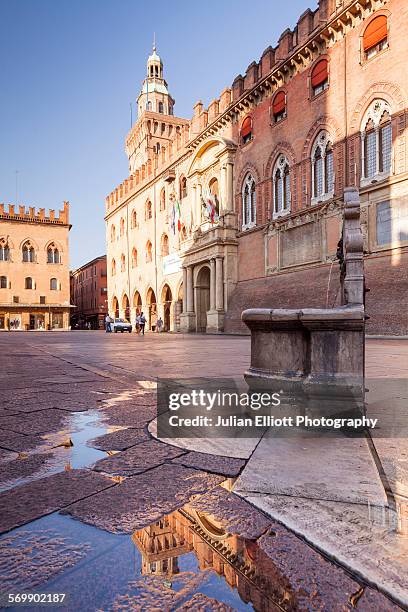 palazzo d'accursio and piazza maggiore in bologna - piazza maggiore bildbanksfoton och bilder