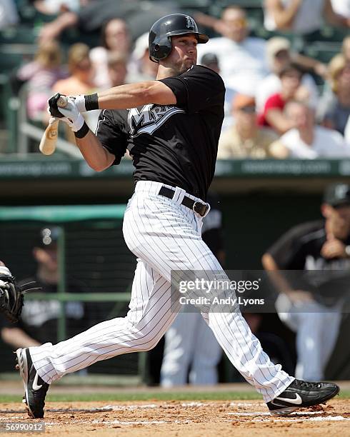 Jeremy Hermida of the Florida Marlins swings at a pitch during the Major League Baseball spring training game against the Baltimore Orioles on March...