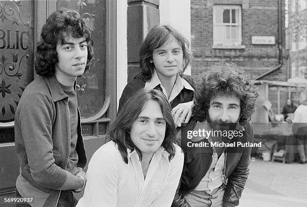 English rock band 10cc outside a pub, 21st May 1974. Left to right: Graham Gouldman, Lol Creme, Eric Stewart and Kevin Godley.