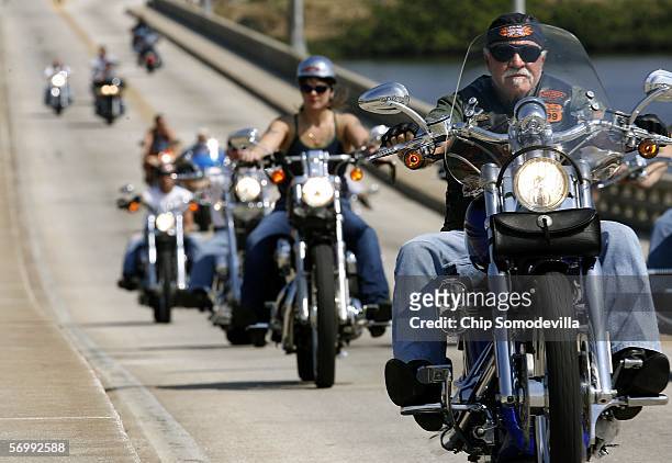 Motorcyclists cross the Main Street Bridge during Bike Week March 3, 2006 in Daytona Beach, Florida. More than 500,000 people are expected to attend...