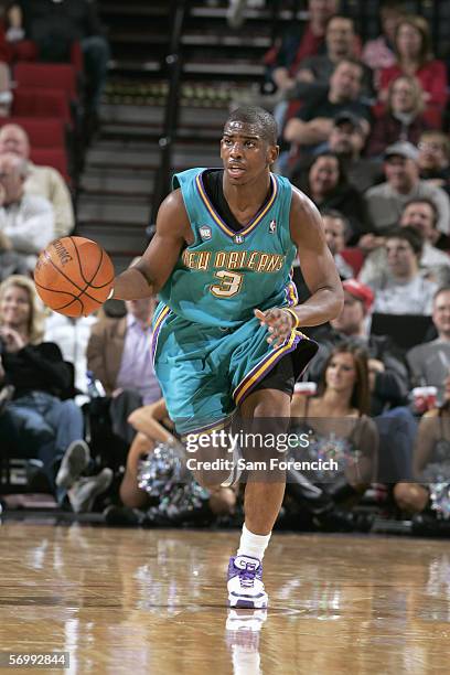 Chris Paul of the New Orleans/Oklahoma City Hornets dribbles the ball against the Portland Trail Blazers on February 26, 2006 at the Rose Garden...