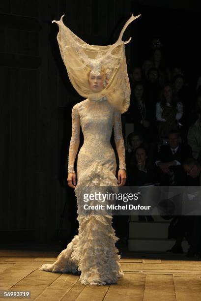 Models walk the catwalk at the Alexander McQueen fashion show at Paris Fashion Week Autumn/Winter 2006/7 on March 3, 2006 in Paris, France.