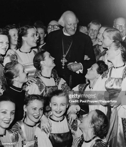 English Priest and Dean of Canterbury, Hewlett Johnson meets a group of young Russian dancers backstage after a Moscow State Dance Company show at...