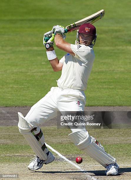 Matthew Hayden for the Bulls hits a square cut during day three of the Pura Cup match between the Victorian Bushrangers and the Queensland Bulls at...
