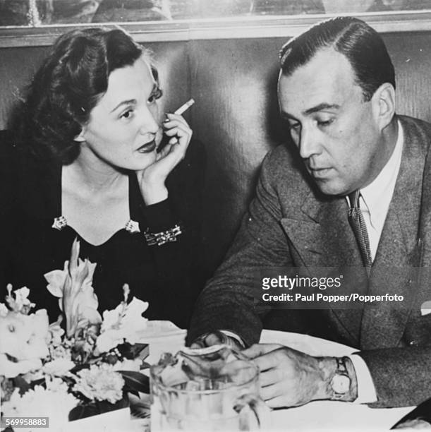 American businessman Dan Topping and actress Kay Sutton pictured dining together at the Stork Club, New York City, January 2nd 1946.