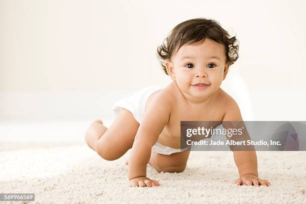 baby - crawling stock pictures, royalty-free photos & images