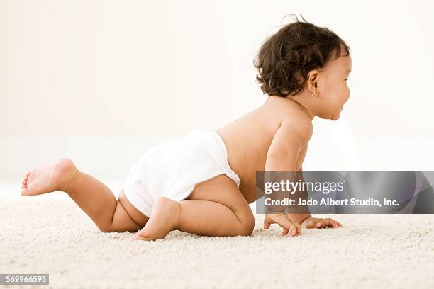 baby - crawling stock pictures, royalty-free photos & images