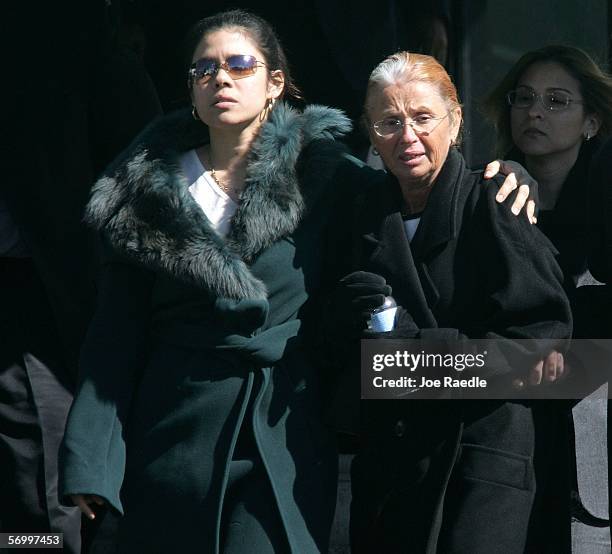 Alejandra St. Guillen and her mother Maureen St. Guillen exit the Gormley Funeral Home after attending the funeral service for their sister/daughter...
