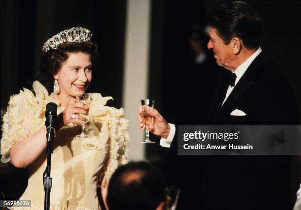 Queen Elizabeth ll toasts President Ronald Reagan at a banquet during the Queen's official visit to the US in March 1983 in in San Francisco,...