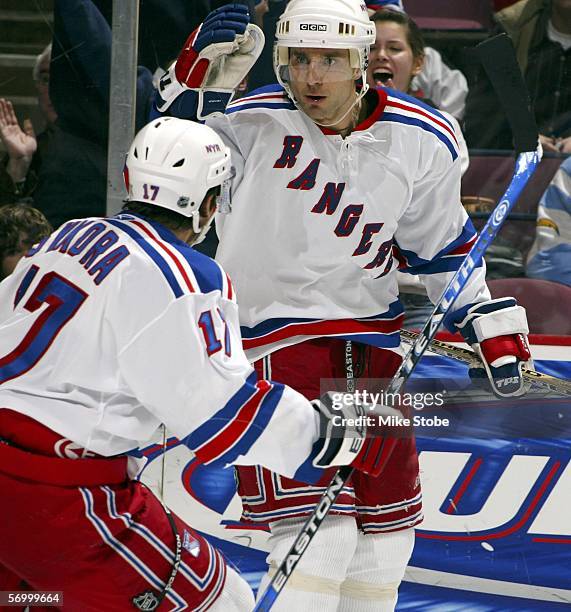 Martin Rucinsky celebrates his second period goal with teammate Petr Sykora of the New York Rangers against the New Jersey Devils at the Continental...