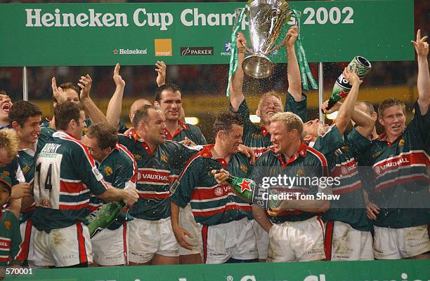 Leicester Tigers players celebrate winning the trophy during the Heineken Cup Final between Leicester Tigers and Munster at the Millennium Stadium,...