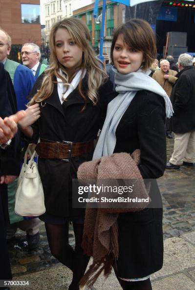 Sir Bob Geldof's daughters Peaches and Pixie pose as their father