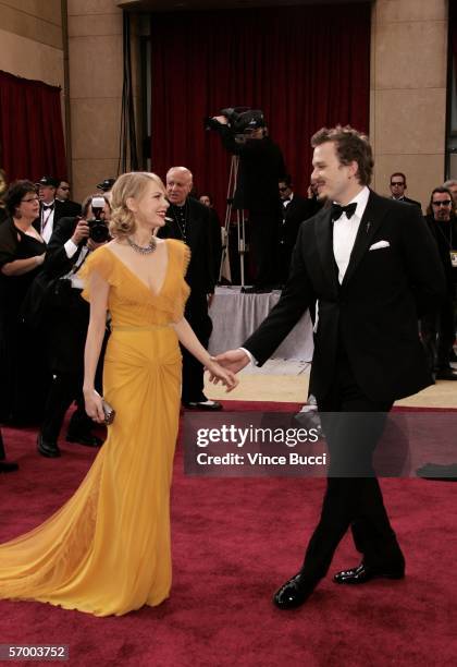 Oscar nominee for Best Actor, Heath Ledger and actress Michelle Williams, from "Brokeback Mountain" arrives to the 78th Annual Academy Awards at the...