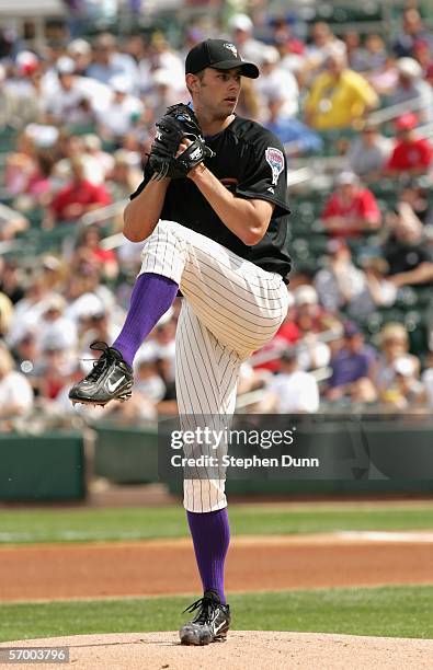 Pitcher Dustin Nippert of the Arizona Diamondbacks winds up to throw a pitch against the Chicago White Sox during a Spring Training game on March 5,...