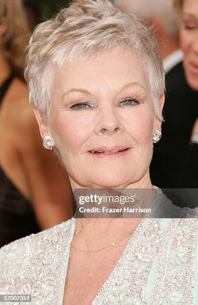 Acrtess Dame Judi Dench arrives to the 78th Annual Academy Awards at the Kodak Theatre on March 5, 2006 in Hollywood, California.