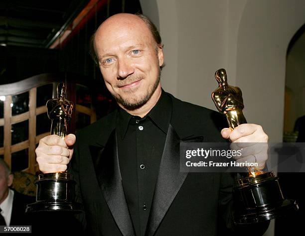 Director Paul Haggis holding the winning awards for Crash attends the Lions Gate "Crash" Oscar Bash held at the Chateau Marmont on March 5, 2006 in...