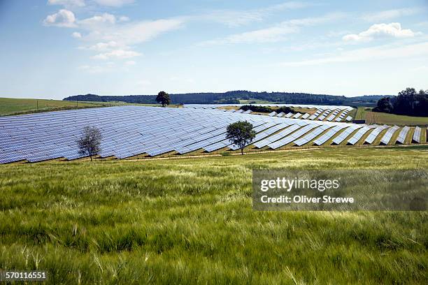 solar farm in bavaria - beieren stockfoto's en -beelden