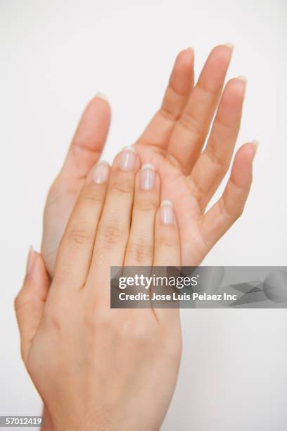 woman clapping her hands - clapping hands white background stock pictures, royalty-free photos & images