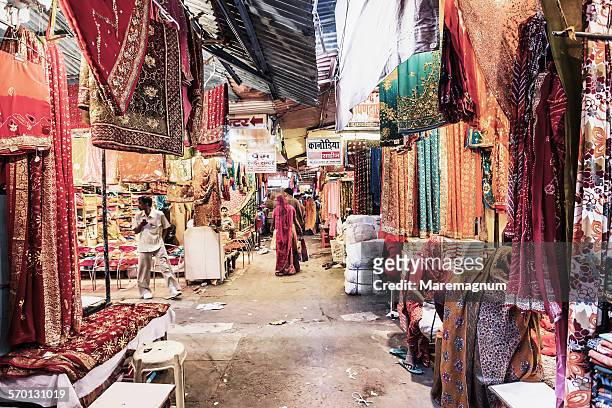 the sari bazaar (market) - india market stock pictures, royalty-free photos & images